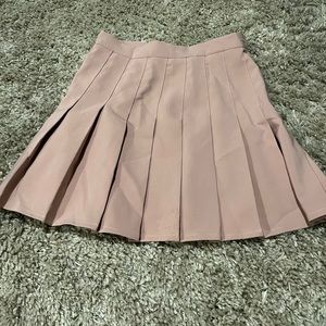 Pale pink pleated skirt